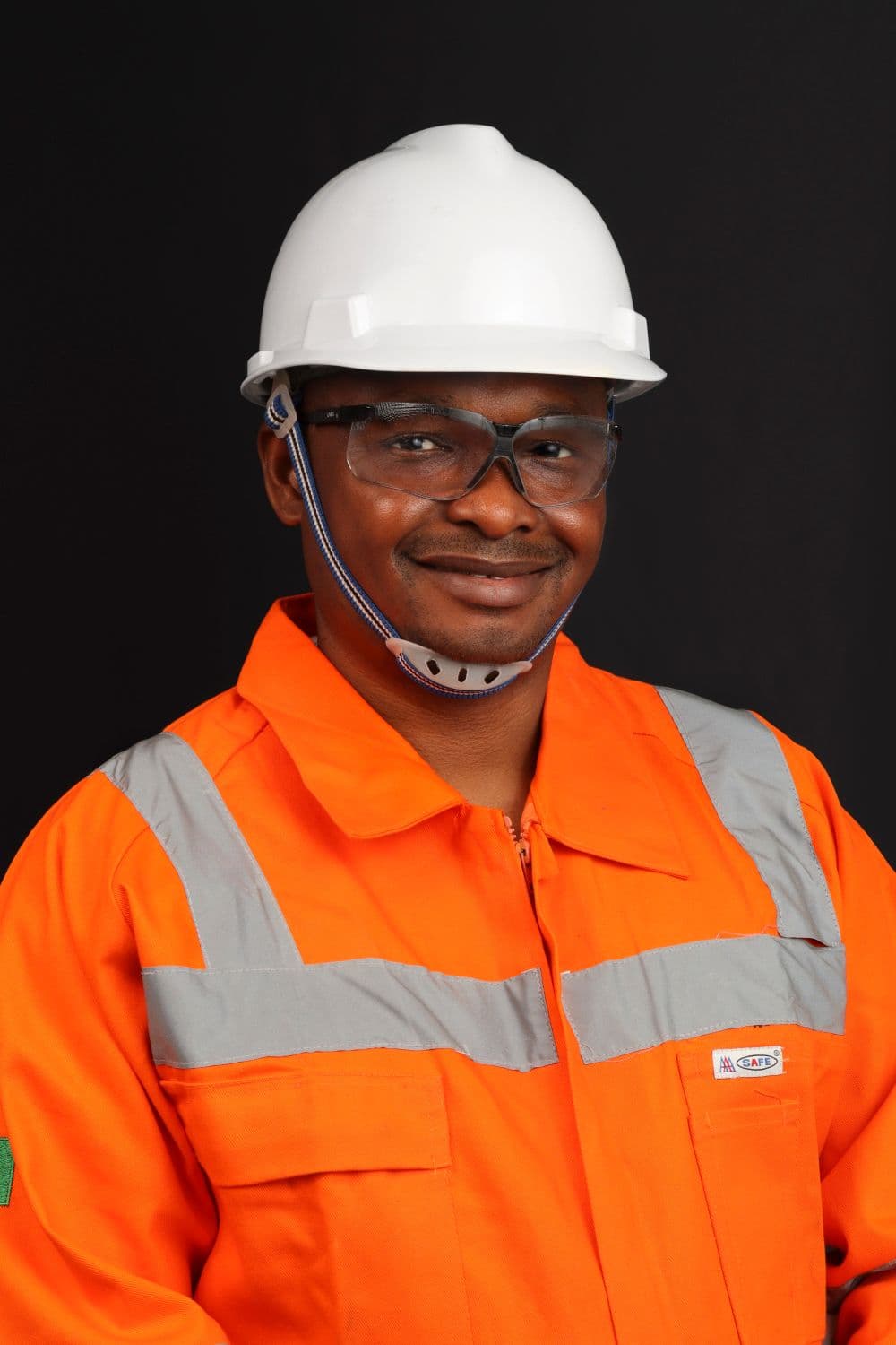 Confident roofing professional in safety gear